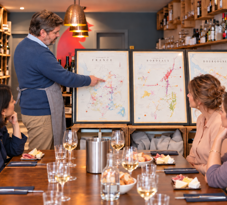 Discover French wine with Henri Sommelier Henri explaining French wine to guests during a tasting at ARCHIBON in Paris